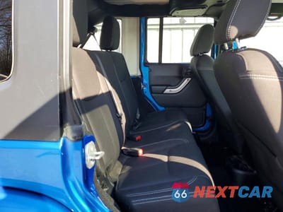 Zdjęcie 10 z 11 samochodu: 2016 JEEP WRANGLER UNLIMITED SAHARA VIN:1C4BJWEG7GL156866 - miniatura