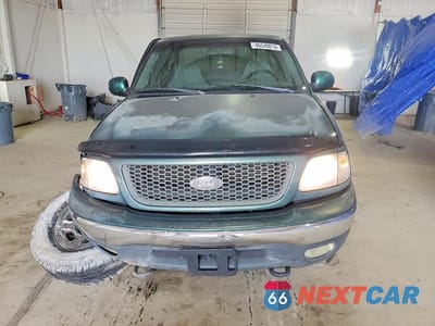 Piąte zdjęcie samochodu w środku: 1999 FORD F150 VIN:1FTRX18L1XNA06068 - miniatura