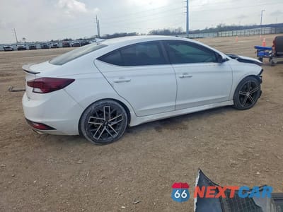 Trzecie zdjęcie samochodu z tyłu: 2020 HYUNDAI ELANTRA SPORT VIN:KMHD04LB4LU012621 - miniatura