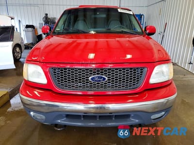 Piąte zdjęcie samochodu w środku: 2001 FORD F150 VIN:1FTRF18W21NA48964 - miniatura