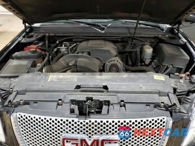 Zdjęcie 12 z 12 samochodu: 2011 GMC YUKON DENALI VIN:1GKS2EEF4BR181183 - miniatura