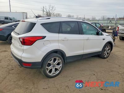 Trzecie zdjęcie samochodu z tyłu: 2019 FORD ESCAPE TITANIUM VIN:1FMCU9J98KUA96325 - miniatura