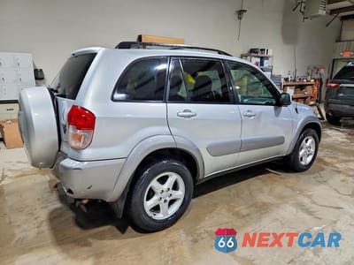 Trzecie zdjęcie samochodu z tyłu: 2001 TOYOTA RAV4 BASE VIN:JTEHH20V216002698 - miniatura