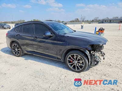 Czwarte zdjęcie samochodu z boku: 2022 BMW X4 XDRIVE30I VIN:5UX33DT00N9M13514 - miniatura