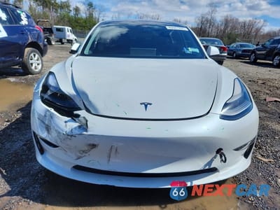 Piąte zdjęcie samochodu w środku: 2021 TESLA MODEL 3 VIN:5YJ3E1EB8MF060954 - miniatura
