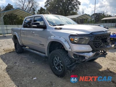 Czwarte zdjęcie samochodu z boku: 2022 RAM 1500 BIG HORN VIN:1C6SRFFT3NN129452 - miniatura