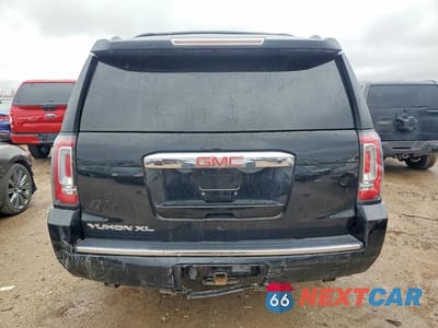 Zdjęcie 6 z 11 samochodu: 2015 GMC YUKON XL DENALI VIN:1GKS2JKJ0FR208919 - miniatura