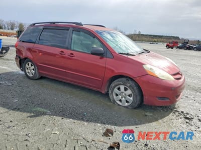 Czwarte zdjęcie samochodu z boku: 2009 TOYOTA SIENNA LE 7-PASSENGER VIN:5TDZK23C19S268679 - miniatura
