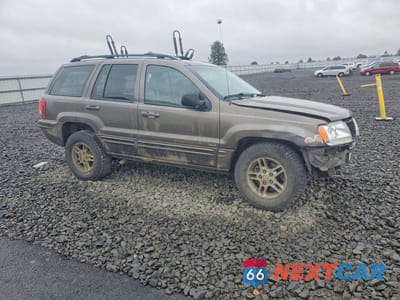 Czwarte zdjęcie samochodu z boku: 2000 JEEP GRAND CHEROKEE LIMITED VIN:1J4GW58N5YC397476 - miniatura