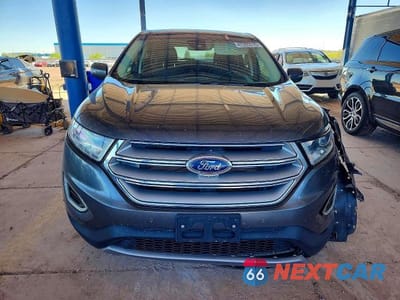 Piąte zdjęcie samochodu w środku: 2017 FORD EDGE TITANIUM VIN:2FMPK4K87HBB99654 - miniatura