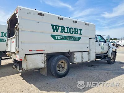 Czwarte zdjęcie samochodu z boku: 2015 FORD F650 SUPER DUTY CHIPPER TRUCK VIN:3FRNX6HD7FV643900 - miniatura
