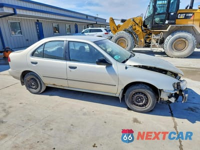 Czwarte zdjęcie samochodu z boku: 1997 NISSAN SENTRA BASE VIN:1N4AB41D3VC735588 - miniatura