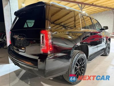 Czwarte zdjęcie samochodu z boku: 2015 GMC YUKON SLT VIN:1GKS2BKC1FR144526 - miniatura