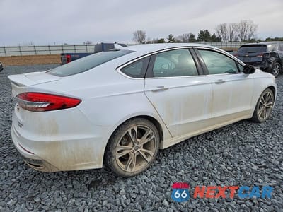 Trzecie zdjęcie samochodu z tyłu: 2019 FORD FUSION TITANIUM VIN:3FA6P0D93KR242918 - miniatura
