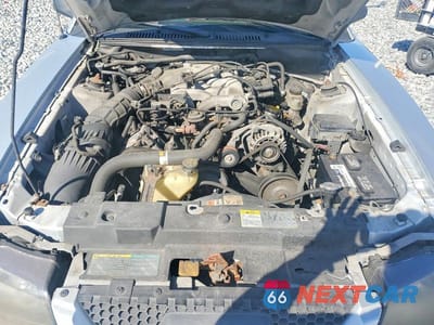 Zdjęcie 11 z 11 samochodu: 2004 FORD MUSTANG VIN:1FAFP406X4F151633 - miniatura