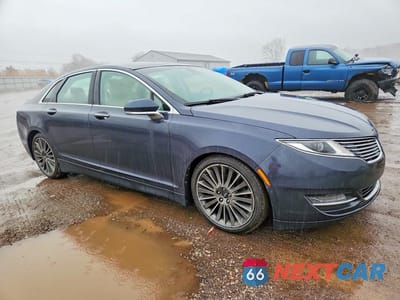 Czwarte zdjęcie samochodu z boku: 2013 LINCOLN MKZ VIN:3LN6L2JK4DR803019 - miniatura