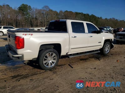 Trzecie zdjęcie samochodu z tyłu: 2016 CHEVROLET SILVERADO K1500 HIGH COUNTRY VIN:3GCUKTEC0GG253647 - miniatura