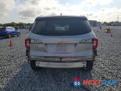 Zdjęcie 6 z 14 samochodu: 2021 HONDA PILOT TOURING VIN:5FNYF6H65MB078729 - miniatura