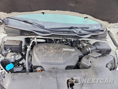 Zdjęcie 12 z 14 samochodu: 2019 HONDA ODYSSEY TOURING VIN:5FNRL6H85KB030594 - miniatura
