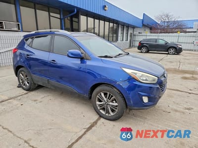 Czwarte zdjęcie samochodu z boku: 2014 HYUNDAI TUCSON SE VIN:KM8JUCAG5EU796844 - miniatura