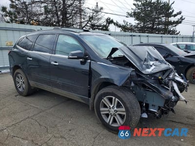 Czwarte zdjęcie samochodu z boku: 2015 CHEVROLET TRAVERSE LT VIN:1GNKVHKD8FJ163577 - miniatura