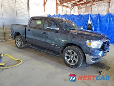 Czwarte zdjęcie samochodu z boku: 2021 RAM 1500 BIG HORN VIN:1C6SRFFT9MN717841 - miniatura