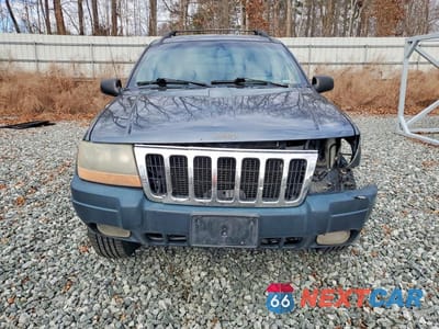 Piąte zdjęcie samochodu w środku: 2001 JEEP GRAND CHEROKEE LAREDO VIN:1J4GW48S31C540513 - miniatura