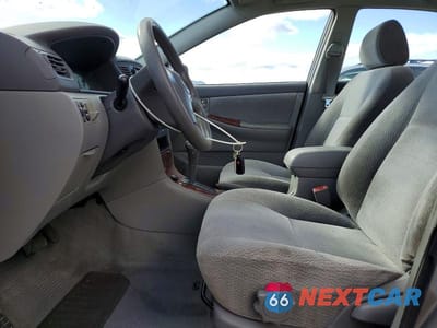 Zdjęcie 7 z 11 samochodu: 2003 TOYOTA COROLLA LE VIN:1NXBR32E33Z055186 - miniatura