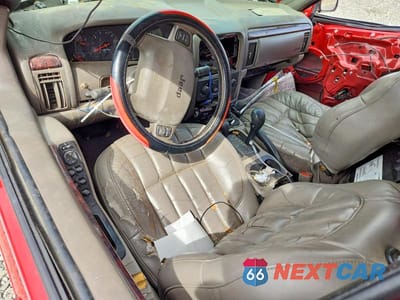 Zdjęcie 8 z 13 samochodu: 2000 JEEP GRAND CHEROKEE LIMITED VIN:1J4GW58N4YC306648 - miniatura