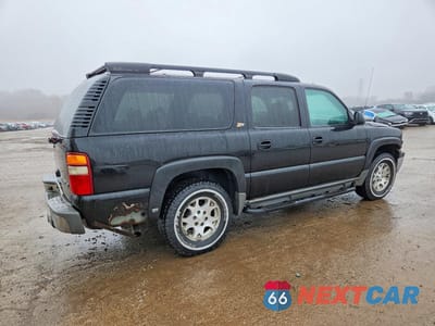 Trzecie zdjęcie samochodu z tyłu: 2003 CHEVROLET SUBURBAN K1500 VIN:3GNFK16Z63G241813 - miniatura