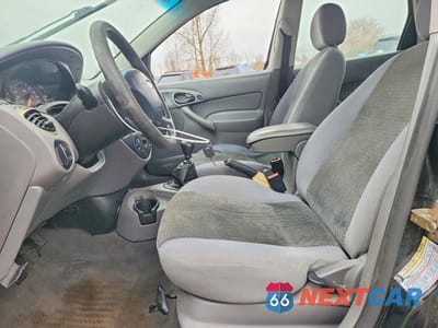 Zdjęcie 7 z 12 samochodu: 2004 FORD FOCUS SE VIN:1FAFP36354W153894 - miniatura