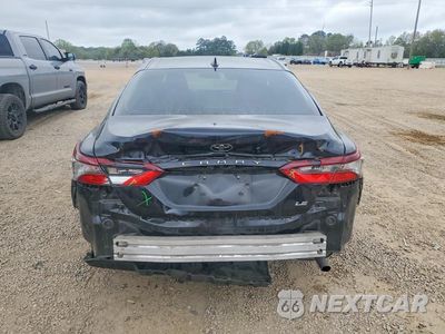 Zdjęcie 6 z 12 samochodu: 2023 TOYOTA CAMRY LE VIN:4T1C11AK5PU831136 - miniatura