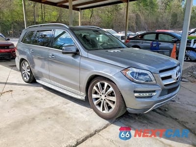 Czwarte zdjęcie samochodu z boku: 2015 MERCEDES-BENZ GL 450 4MATIC VIN:4JGDF6EE0FA516011 - miniatura