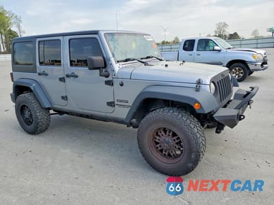 Czwarte zdjęcie samochodu z boku: 2014 JEEP WRANGLER UNLIMITED SPORT VIN:1C4BJWDG9EL159332 - miniatura