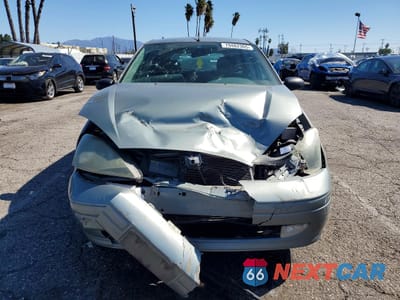 Piąte zdjęcie samochodu w środku: 2004 FORD FOCUS ZX5 VIN:3FAFP37Z74R110972 - miniatura