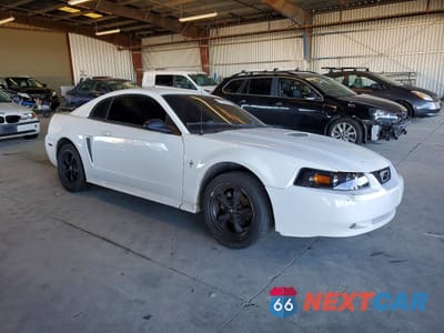 Czwarte zdjęcie samochodu z boku: 2003 FORD MUSTANG VIN:1FAFP40483F312512 - miniatura