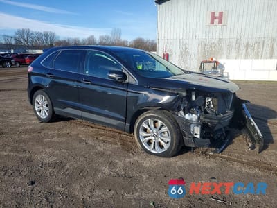 Czwarte zdjęcie samochodu z boku: 2023 FORD EDGE TITANIUM VIN:2FMPK4K92PBA29242 - miniatura