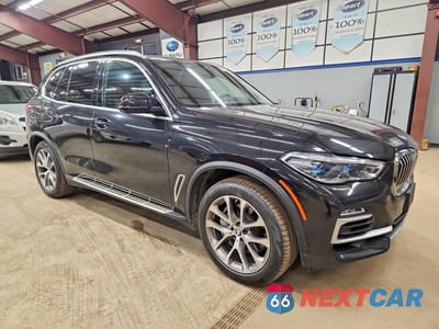 Czwarte zdjęcie samochodu z boku: 2019 BMW X5 XDRIVE50I VIN:5UXJU2C5XKLN66002 - miniatura