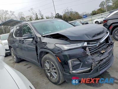 Czwarte zdjęcie samochodu z boku: 2023 CHEVROLET TRAVERSE LT VIN:1GNERHKW4PJ166058 - miniatura