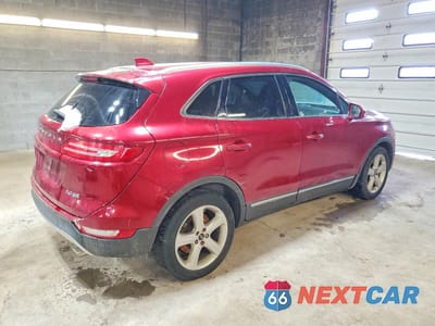 Trzecie zdjęcie samochodu z tyłu: 2015 LINCOLN MKC VIN:5LMCJ2A96FUJ22441 - miniatura