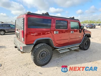 Trzecie zdjęcie samochodu z tyłu: 2004 HUMMER H2 VIN:5GRGN23U64H104704 - miniatura