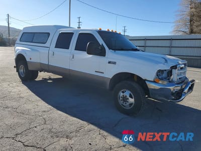 Czwarte zdjęcie samochodu z boku: 2000 FORD F350 SUPER DUTY VIN:1FTWW33F0YEE30068 - miniatura