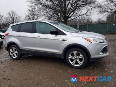 Czwarte zdjęcie samochodu z boku: 2016 FORD ESCAPE SE VIN:1FMCU0GX4GUB04204 - miniatura