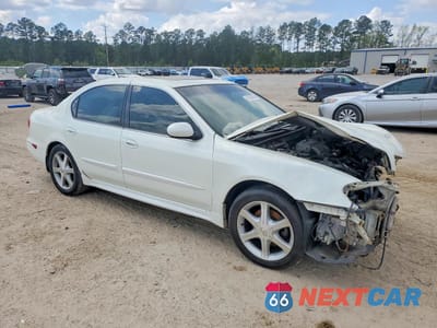 Czwarte zdjęcie samochodu z boku: 2002 INFINITI I35 BASE VIN:JNKDA31AX2T027827 - miniatura
