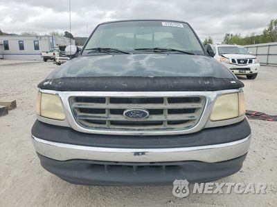 Piąte zdjęcie samochodu w środku: 2001 FORD F150 VIN:1FTRX17W51NB20903 - miniatura