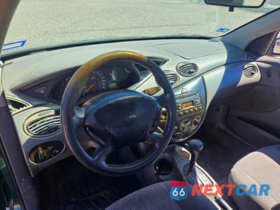 Zdjęcie 9 z 10 samochodu: 2000 FORD FOCUS SE VIN:1FAFP3433YW219500 - miniatura