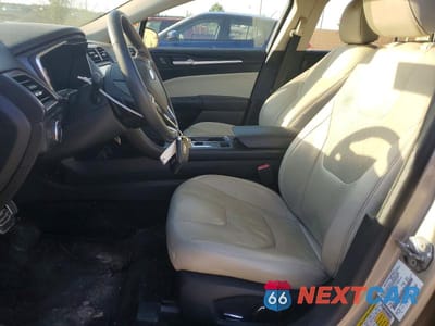 Zdjęcie 7 z 11 samochodu: 2018 FORD FUSION TITANIUM VIN:3FA6P0D92JR168289 - miniatura