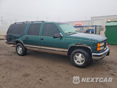 Czwarte zdjęcie samochodu z boku: 1996 GMC SUBURBAN C1500 VIN:1GKEC16R8TJ714552 - miniatura