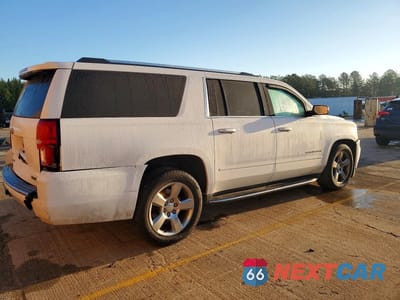 Trzecie zdjęcie samochodu z tyłu: 2018 CHEVROLET SUBURBAN C1500 PREMIER VIN:1GNSCJKC8JR113051 - miniatura