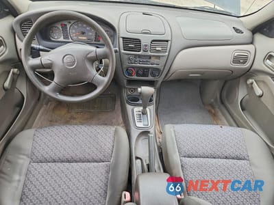 Zdjęcie 8 z 12 samochodu: 2001 NISSAN SENTRA XE VIN:3N1CB51D11L454920 - miniatura